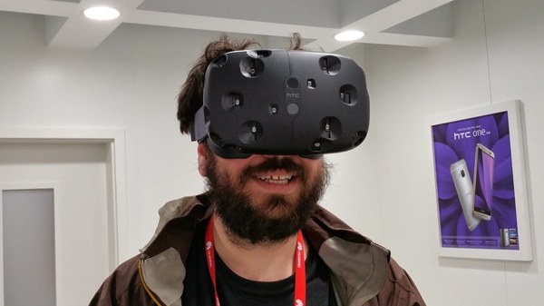 Dan Page wearing an HTC Vive mock-up at Mobile World Congress, 2015 Dan Page in an HTC Vive